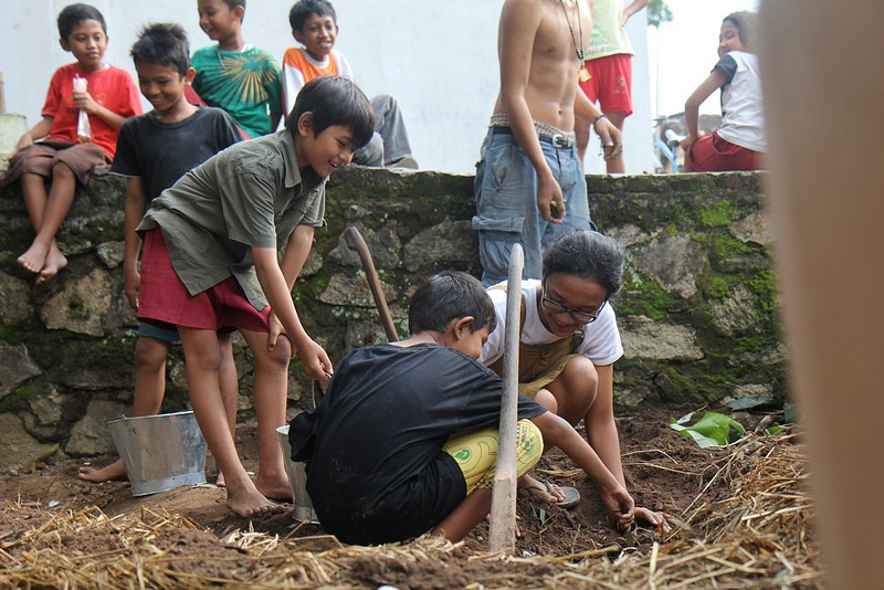 The first ‘blitz’ in the village of Nitiprayan. Local children were involved in making the first edible garden and learning about soil and composting- Paul Daley Making food politics personal